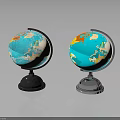 Two Globes With Black And Silver Bases Blue Ocean And Colored Continents On Gray Background