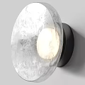 Modern Round Wall Lamps With Frosted Glass Shades And Black Bases Illuminated