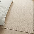 Beige Woven Square Rug with Soft Texture in Bedroom on Wooden Floor