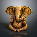 Golden Ganesha Statue In Sitting Posture With Elephant Ears And Trunk