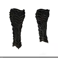 Pair of Medieval Black Leg Armor With Wavy Textured Patterns And Metallic Finish