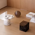 Modern Marble Cube Coffee Table With Stacked Books Decorative Sphere And Tray