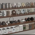 Various Tea Cans Teapots And Ceramic Sets Display On Wooden Shelves