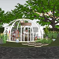 Park Landscape Featuring White Dome Structure With Bookshelves Books Green Trees And Decorative String Lights