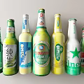 Assorted Beer Bottles And Glasses With Colorful Labels And Various Brands