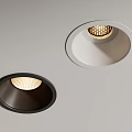 Two Recessed Spotlights With Black And White Trim Illuminated On Ceiling