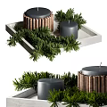 Decorative Ornament Set With Black Candles Green Pine Branches And Copper Accents On Tray