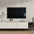 Modern White and Gray TV Stand with TV Plant Decorative Items and Vertical Striped Wall