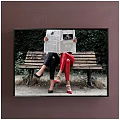 Portrait Painting Of Two People On Bench With Newspaper Covering Faces And Colored Pants