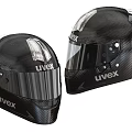 Two Uvex Carbon Fiber Helmets with Transparent Visors and Black Design