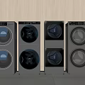 Four Modern Front Load Washing Machines in Silver and White Side by Side Design