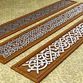 Wooden Carved Decorative Strips With Intricate Openwork Patterns On Textured Surface 3d model