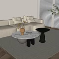 Marble Coffee Table With Black Base Alongside Beige Sofa Small Side Table And Green Plant 3d model