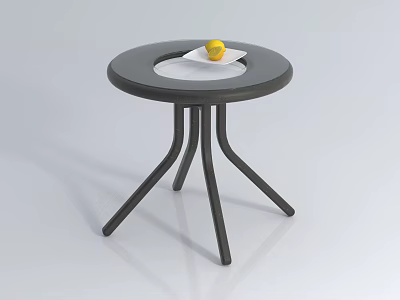 Round Black Coffee Table with Three Legs and White Plate Yellow Fruit 3d model