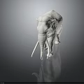 White Elephant Sculpture With Long Ivory Smooth Surface And Dark Background