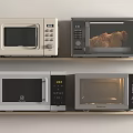 Various Kitchen Appliances With Multiple Microwave Ovens Displayed On Shelf 3d model
