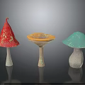 Colorful Glittery Mushroom Sculptures In Red Orange Blue On Black Background
