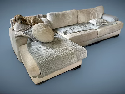 Modern Sectional Sofa With Soft Beige Fabric Cushions And Decorative Throw Blanket 3d model
