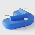 Blue Curved Public Chair With Modular Design And Orange Circular Accents