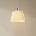 Modern Simple Pendant Light With Light Beige Linen Dome Shade Illuminated In Interior Space