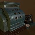 Vintage Mobile Digital Tech Old Cash Register and Telephone on Table