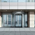 Modern Commercial Building Entrance With Revolving Glass Door Stone Walls And Steps