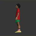 Man wearing red number 7 jersey green shorts yellow socks shoes against gray background