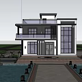 Modern Detached Villa Exterior With Large Windows Glass Balcony And Poolside Lanterns