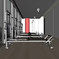 Modern Bright Fitness Studio With Pilates Reformers Large Windows And Red Columns