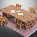 Wooden Long Table and Chairs Set with Papers on Top Placed on Pink Carpet