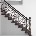 Classic Staircase Featuring Wrought Iron Railings With Intricate Floral Patterns And Dark Wooden Steps