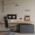 Modern Desk With Computer Monitor Open Book Decorative Painting And Black Chair