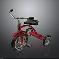 Vintage Red Tricycle With Black Seat Silver Handlebars Three Wheels And Metal Frame