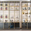 Modern Wine Storage Cabinet With Gold Frame Glass Door And Wine Bottles Glasses Decorative Items