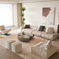 Modern Beige Sofa Coffee Table Set With Armchairs Stools Plant Floor Lamp And Artwork