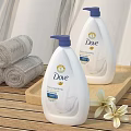 Dove Nourishing Body Wash With Rolled Towels On Wooden Tray And Flowers