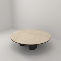 Round Modern Coffee Table With Light Wooden Top And Black Cylindrical Legs
