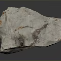 Natural Decorative Stone With White Brown And Orange Textures On Black Surface