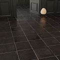 Dark Porcelain Floor Tiles In Indoor Hallway With Black Door And Round Lamp Design