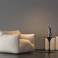 Beige Single Sofa With Side Table Metal Vase And Open Book Gray Wall Dark Floor