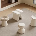 Modern White Stools With Various Designs In Cozy Interior Setting On Carpet