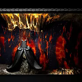 Window Display with Ice Cave Themed Background and Mannequin in Elegant Long Dress
