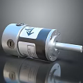 Cylindrical Metal Mechanical Device With Silver Housing Black Section And Shaft