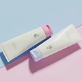 Elegant Perfume Cosmetics White Tubes With Pink Purple Caps And Soft Color Design