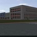 Modern Industrial Factory Building With Large Glass Windows And Green Lawn Surrounding Road