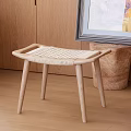 Natural Wooden Stool with Woven Seat and Slender Legs in Indoor Space with Light Wooden Floor