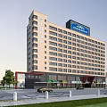 Modern High Rise Hotel Building With Light Beige Exterior Signboard And Shops At Bottom