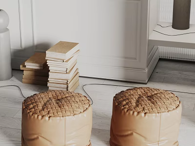 Tan Poufs With Woven Texture In Indoor Setting With White Door Stacked Books 3d model