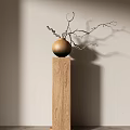 Minimalist Ceramic Vase With Twigs Placed On Wooden Pillar Against Light Wall