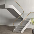 Modern Elegant Staircase with Glass Handrail Gold Railing Gray Steps Wooden Floor and Indoor Plant